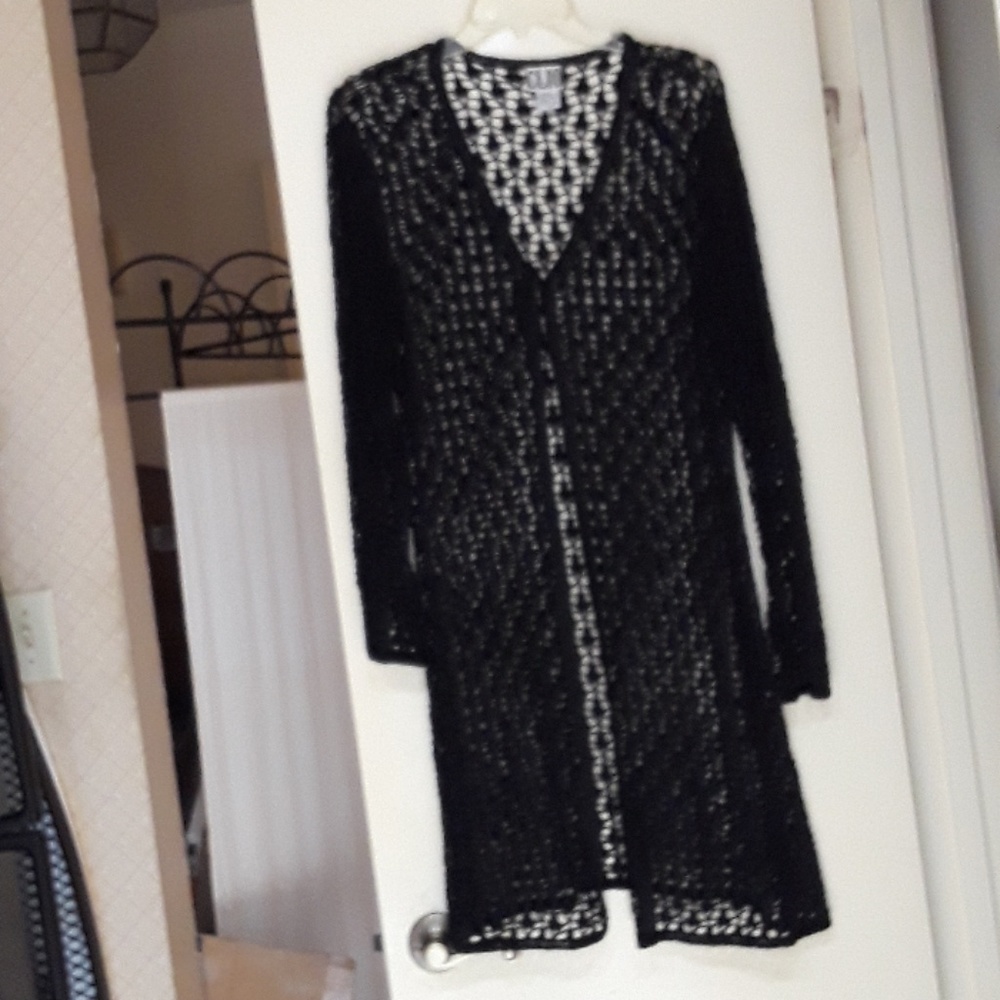 Long loosely knit black sweater